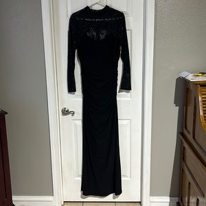 Flattering evening gown. Gathers in the back and a cut out in the front!